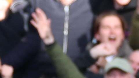 Manchester City's Marc Guehi, left, and Jeremy Doku celebrate after scoring during the Premier League soccer match between Chelsea and Manchester City in London, Sunday, April 12, 2026. (AP Photo/Ian Walton)
