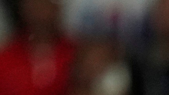 PSG's Khvicha Kvaratskhelia, center, makes an attempt to score as Bayern's Dayot Upamecano tries to stop him during the Champions League semifinal first leg soccer match between Paris Saint-Germain and Bayern Munich in Paris, Tuesday, April 28, 2026. (AP Photo/Christophe Ena)