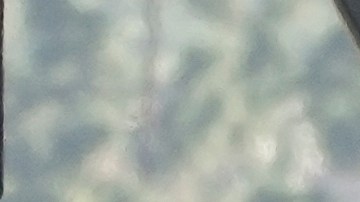 Two investigators stand next to a mangled SUV that struck Los Angeles County sheriff's recruits in Whittier, Calif., Wednesday, Nov. 16, 2022. The vehicle struck several Los Angeles County sheriff's recruits on a training run around dawn Wednesday, some were critically injured, authorities said. (AP Photo/Jae C. Hong)