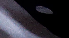 A school teacher dishes out servings of salad and soup for lunch, which happens to be Salad every Tuesday, at Delcare Edu Center, a local kindergarten and child care center in the business district of Singapore on Tuesday, May 6, 2014. Everyday, lunch is prepared by the school kitchen staff and efforts to promote healthy eating in this particular center is seen in painstaking efforts in selection of their ingredients and food preparation methods. The children in this school are also taught to accept a wide variety of food, and the principal plans a weekly menu at the start of each school term. Healthy snacks consisting of fruits, home-made bread, natural beans, soup, and barley are served between meals. (AP Photo/Wong Maye-E)