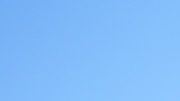 Pro and anti-Trump demonstrators rally outside the U.S. Supreme Court, before justices hear oral arguments on whether President Donald Trump can deny citizenship to children born to parents who are in the United States illegally or temporarily, on Capitol Hill, in Washington, Wednesday, April 1, 2026. (AP Photo/J. Scott Applewhite)