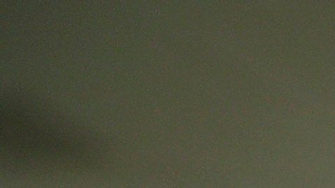 FILE - In this Aug. 28, 2019, photo, detainees, background, wait to be processed at the Adelanto ICE Processing Center in Adelanto, Calif. In a wind-whipped California desert town, a sprawling facility can house nearly 2,000 immigrant detainees facing the prospect of deportation. These days, however, the privately-run detention center in Adelanto is nearly empty. (AP Photo/Chris Carlson, File)