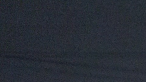 A car crosses under the dark the Sixth Street Viaduct downtown Los Angeles early morning Tuesday, Oct. 14, 2025. (AP Photo/Damian Dovarganes)