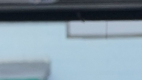 A Waymo vehicle, left, drives in San Bruno, Calif., Tuesday, Sept. 30, 2025. (AP Photo/Jeff Chiu)