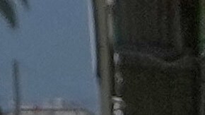 A man carry his belongings crosses on foot through a destroyed bridge that was hit in an Israeli airstrike in Qasmiyeh near the coastal city of Tyre, south Lebanon, Thursday, April 16, 2026. (AP Photo/Mohammed Zaatari)