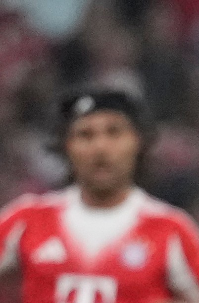 Bayern's Jonathan Tah, left, challenges for the ball with Real Madrid's Ferland Mendy during the Champions League quarterfinal second leg soccer match between Bayern Munich and Real Madrid in Munich, Germany, Wednesday, April 15, 2026. (AP Photo/Matthias Schrader)