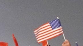 Donald Trump durante su arribo a China