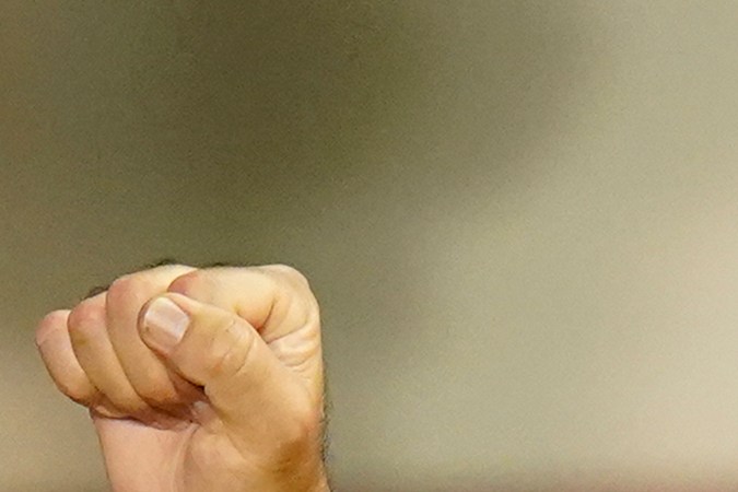 Aficionados de la Selección Mexicana reaccionan durante un partido del Mundial en una zona de transmisión