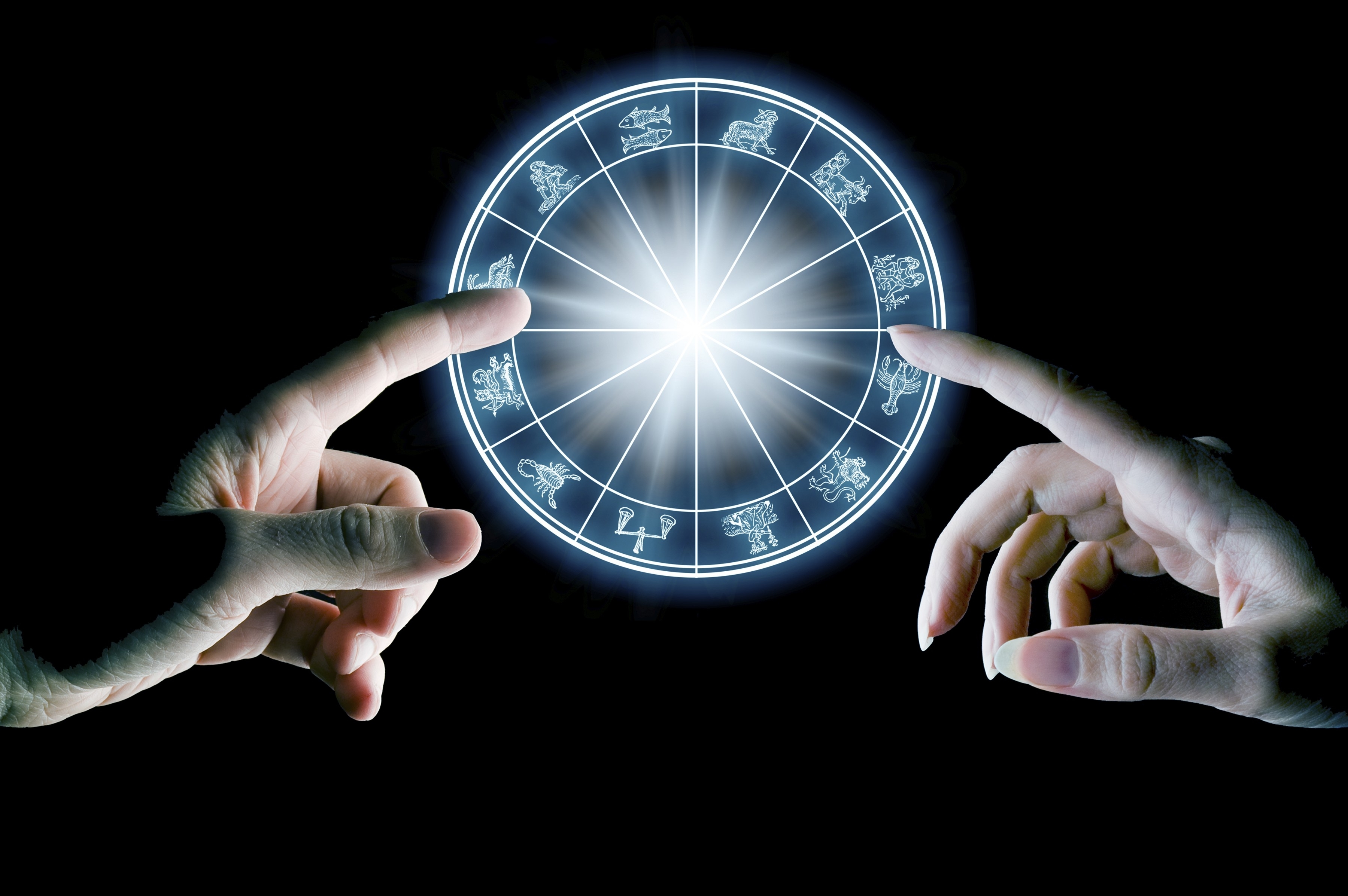 Hands,Touching,An,Astrology,Wheel