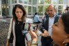 Nancy Iskander, left, holding the hand of her husband, Karim, leaves Van Nuys Courthouse on Monday, June 10, 2024, in Van Nuys, Calif., after attending the sentencing hearing in the murder trial of Rebecca Grossman, who is charged in the deaths of their two sons, Mark, 11, and Jacob, 8. Grossman was sentenced Monday to 15 years to life in prison for the hit-and-run deaths of the two young brothers in a crosswalk. (AP Photo/Damian Dovarganes)