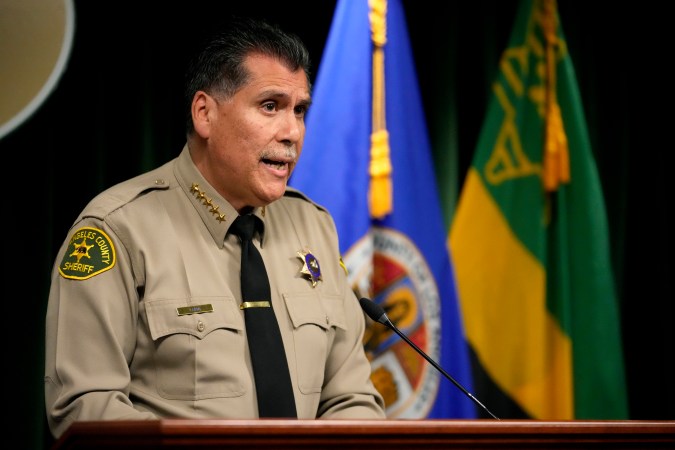FILE - Los Angeles County Sheriff Robert Luna speaks at a news conference on Feb. 20, 2023, in Los Angeles. For the second time in a week, the Los Angeles County sheriff has decried the use of force by deputies in the Antelope Valley after a woman holding a baby was punched in the face last year. The Sheriff's Department on Wednesday, July 12, 2023, released bodycam video showing a deputy punching the woman twice in the face as she held her 3-week-old infant during a July 2022 traffic stop in Palmdale. (AP Photo/Damian Dovarganes, File)