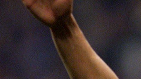 England's Michael Owen celebrates the 1-1 goal for his team during a World Cup 2002 qualifying match of Group 9 Germany vs England in the Olympic stadium of Munich, southern Germany, on Saturday, Sept. 1, 2001. (AP Photo/Michael Probst)