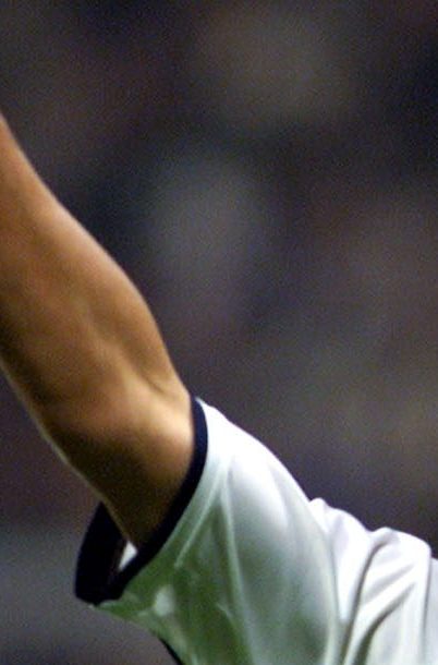 England's Michael Owen celebrates the 1-1 goal for his team during a World Cup 2002 qualifying match of Group 9 Germany vs England in the Olympic stadium of Munich, southern Germany, on Saturday, Sept. 1, 2001. (AP Photo/Michael Probst)