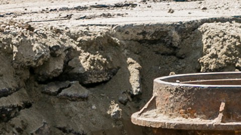 Los Angeles Department of Water and Power "Y" shaped juncture where a water rupture occurred, involving two main trunk lines is seen on Sunset Boulevard in Los Angeles Thursday, July 31, 2014. Work crews have stopped the last of the water gushing from a 30-inch pipe some 30 hours after it burst. Damage costs have yet to be pegged from the rupture of the pipeline that spewed more than 20 million gallons of water in the midst of California's worst drought in decades. The break in the 93-year-old pipe left a swath of the UCLA campus including its basketball arena swamped with water. (AP Photo/Damian Dovarganes)