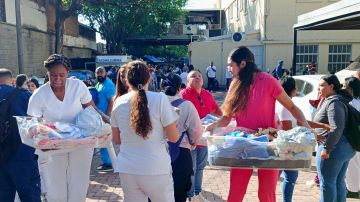 "Mi prioridad era sacar a esos niños": la historia de una de las imágenes más conmovedoras del terremoto en Colombia
