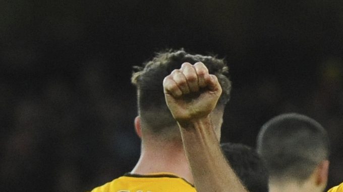 Wolverhampton's Raul Jimenez celebrates after he scores his sides first goal during the English FA Cup third round soccer match between Wolverhampton Wanderers and Liverpool at the Molineux Stadium in Wolverhampton, England, Monday, Jan. 7, 2019. (AP Photo/Rui Vieira)