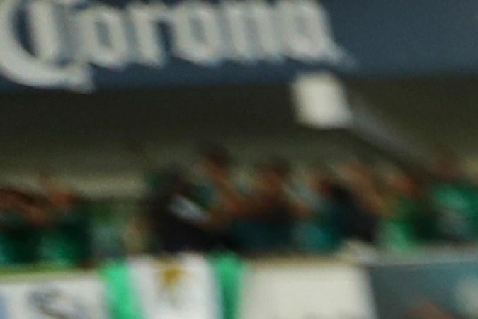 Tigres' head coach Ricardo Ferreti, right, embrace Leon's head coach Ignacio Ambriz during the final Mexico soccer league championship match in Leon, Mexico, Sunday, Nov. 26, 2019. (AP Photo/Refugio Ruiz)