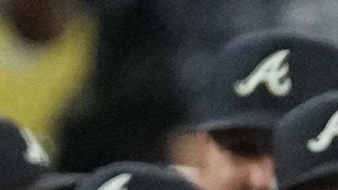 Atlanta Braves starting pitcher Ray Kerr, center right, celebrates with center fielder Michael Harris II (23) and other teammates after the Braves defeated the Los Angeles Dodgers 3-2 in Game 2 of a National League Division Series baseball game Sunday, Oct. 4, 2026, in Los Angeles. (AP Photo/Jae C. Hong)