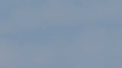 A helicopter passes by the Chrysler Building in New York, Tuesday, July 31, 2018. (AP Photo/Seth Wenig)